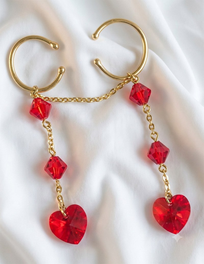 Gold pussy dangle jewellery with ruby Swarovski crystals
