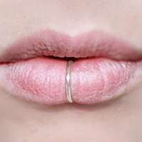 Non-piercing fake lip ring jewellery in solid silver.