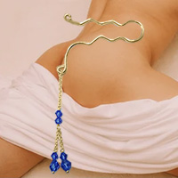 Non-piercing gold anal jewellery with dangles for men.