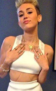 Miley Cyrus wearing a belly chain