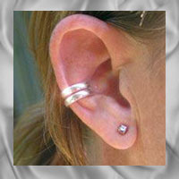 Adjustable silver ear cuff jewellery.