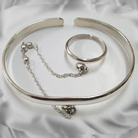Silver slave bracelet and bangle jewellery.