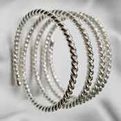 Long adjustable spiral scrotum and cock ring.