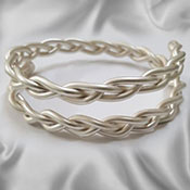 Matt silver braided adjustable cock ring showing handmade design