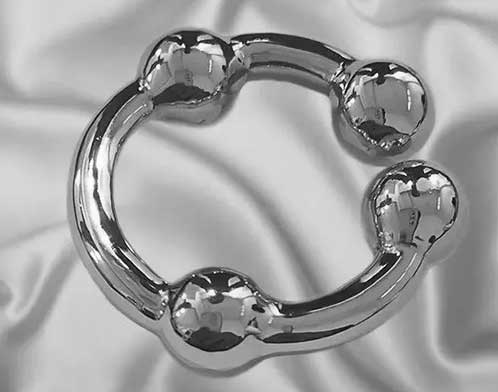 Real custom-designed solid silver cock ring by Hidden Delites