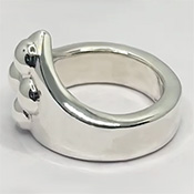 Sculptured sphere cock ring jewellery.