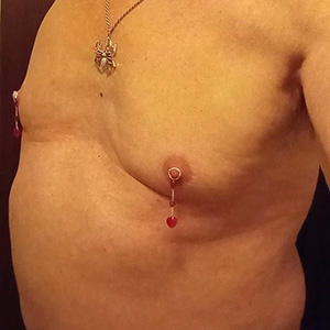 Nipple Ring dangles jewelry worn by a man