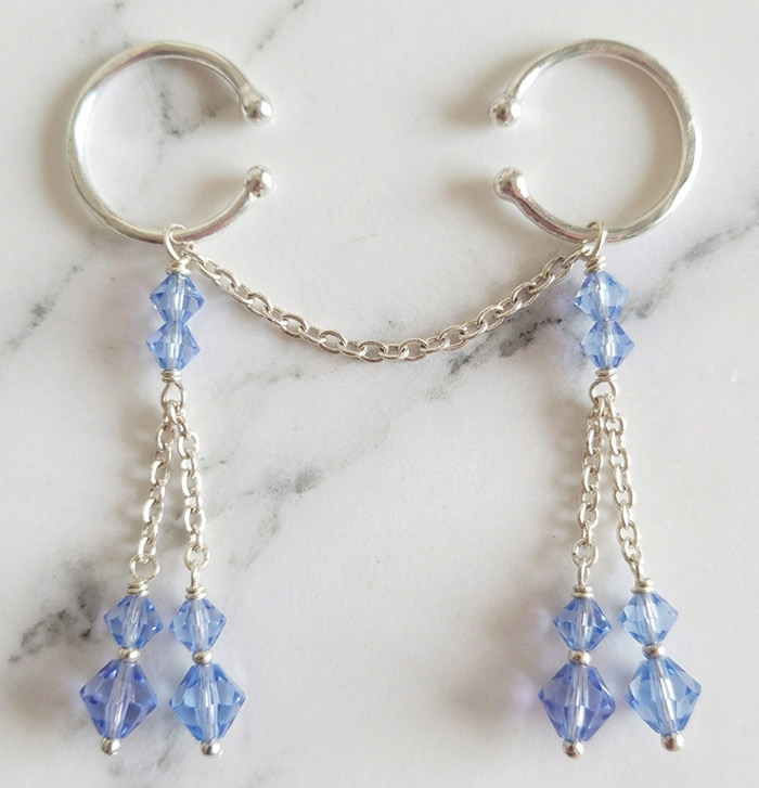 Light blue Swarovski crystal pussy dangle jewellery