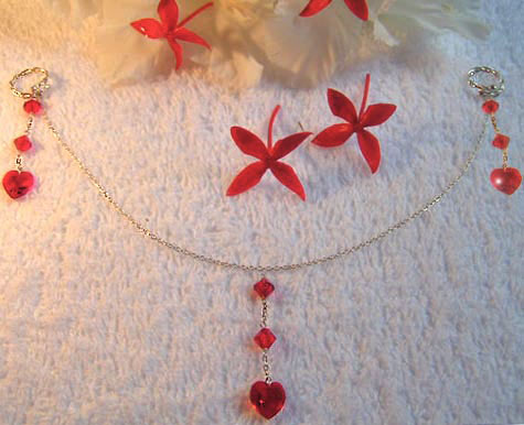 Non-piercing silver nipple chains with braided rings and Swarovski love hearts