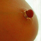 Eye-catching triple-wrap nipple jewellery designed to adorn the breasts without piercing.