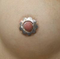Small petite petal silver nipple shield showing the non-piercing fit