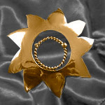 Gold nipple shield centre ring open for fitting